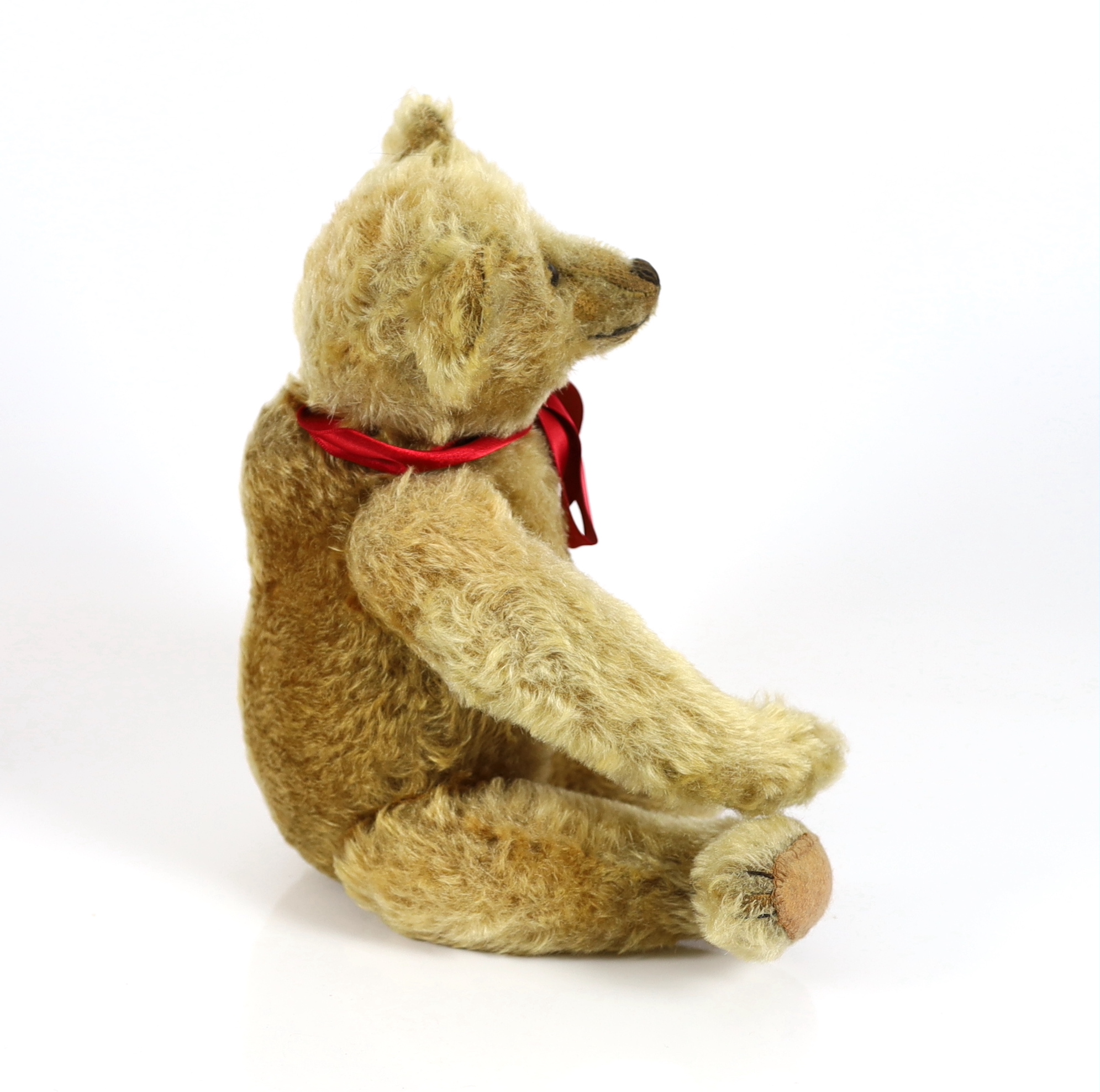 An early Steiff, c.1908, 40cm, no button, in very good condition, replaced paw pads